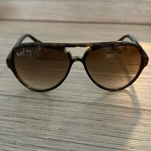 Ray-Ban Sunglasses worn a couple times. Perfect condition.